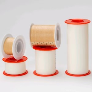 Microporous nonwoven adhesive tape