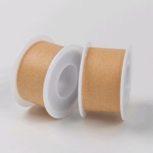 Microporous nonwoven adhesive tape