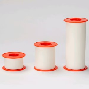 Microporous nonwoven adhesive tape